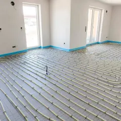 Ogrzewanie podłogowe w bloku: zalety, wady i koszty instalacji
