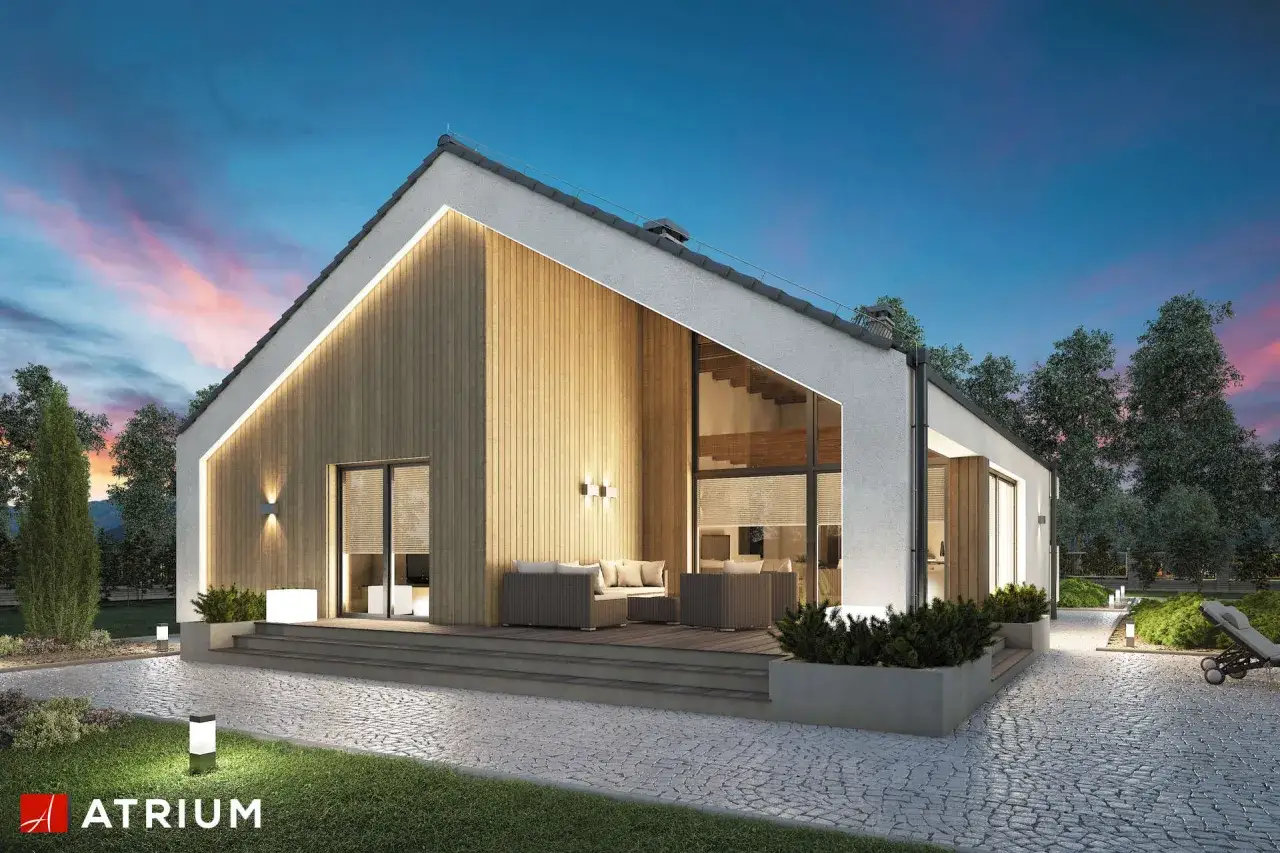 Nowoczesny dom z drewnianym wiatrołapem przed wejściem. Oświetlenie zewnętrzne podkreśla architekturę.